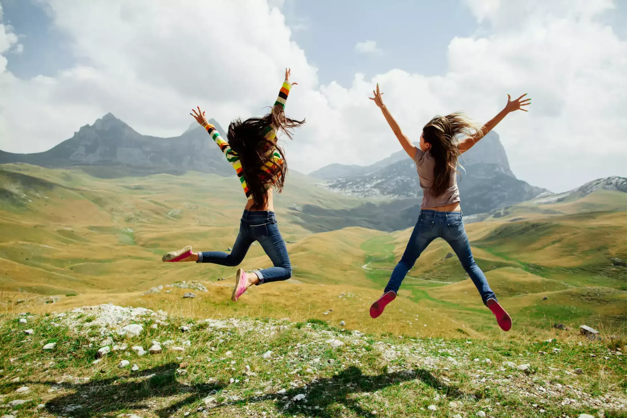 Two girls mountaineering in the mountains of Montenegro